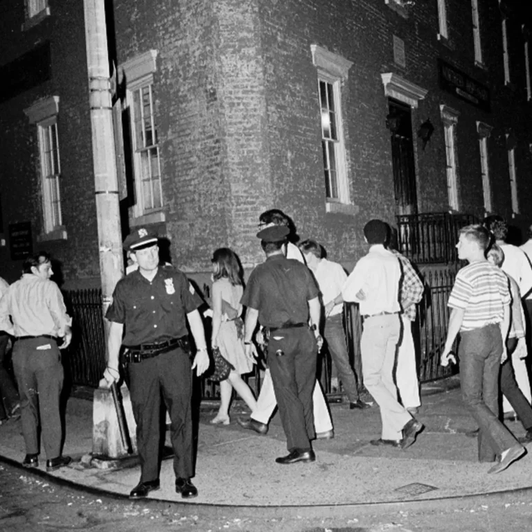 Crowds near the Stonewall Inn several days after the raid on June 28, 1969. [Credit: Larry Morris/The New York Times]